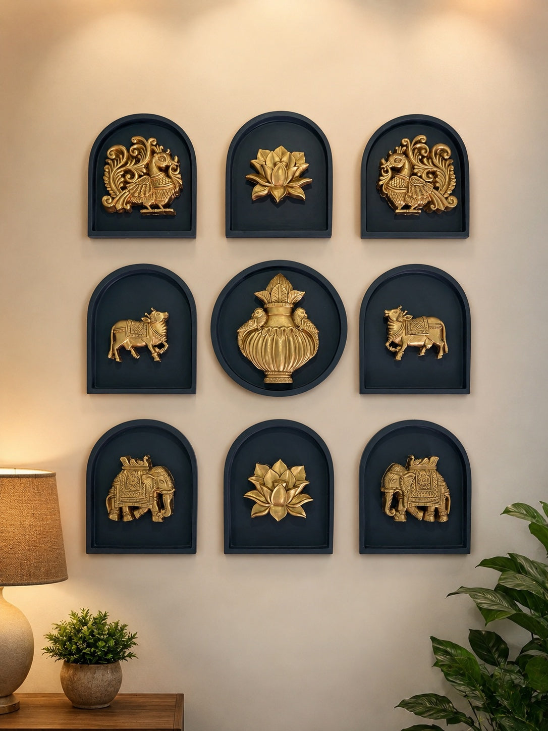 Decorative prabhavali wall motifs installed as traditional Indian wall décor in an interior space in bronze colour