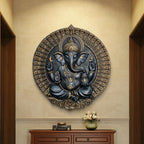 Circular 3.5x3 feet Lord Ganesha wall hanging in black with bronze highlights, detailed 3D relief mural for spiritual décor.