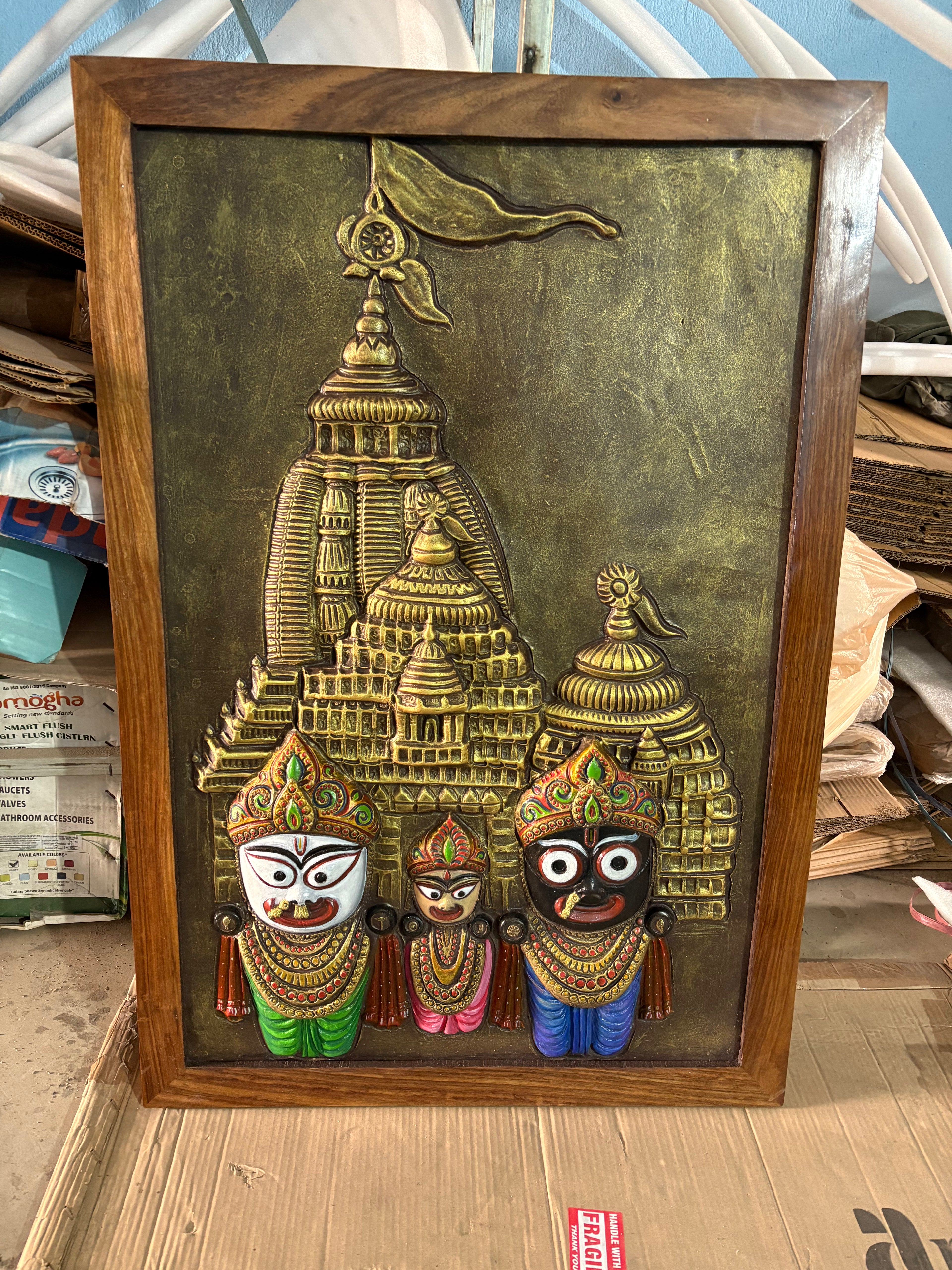 Golden finish Lord Jagannath relief mural wall decor designed for spiritual and luxury interiors