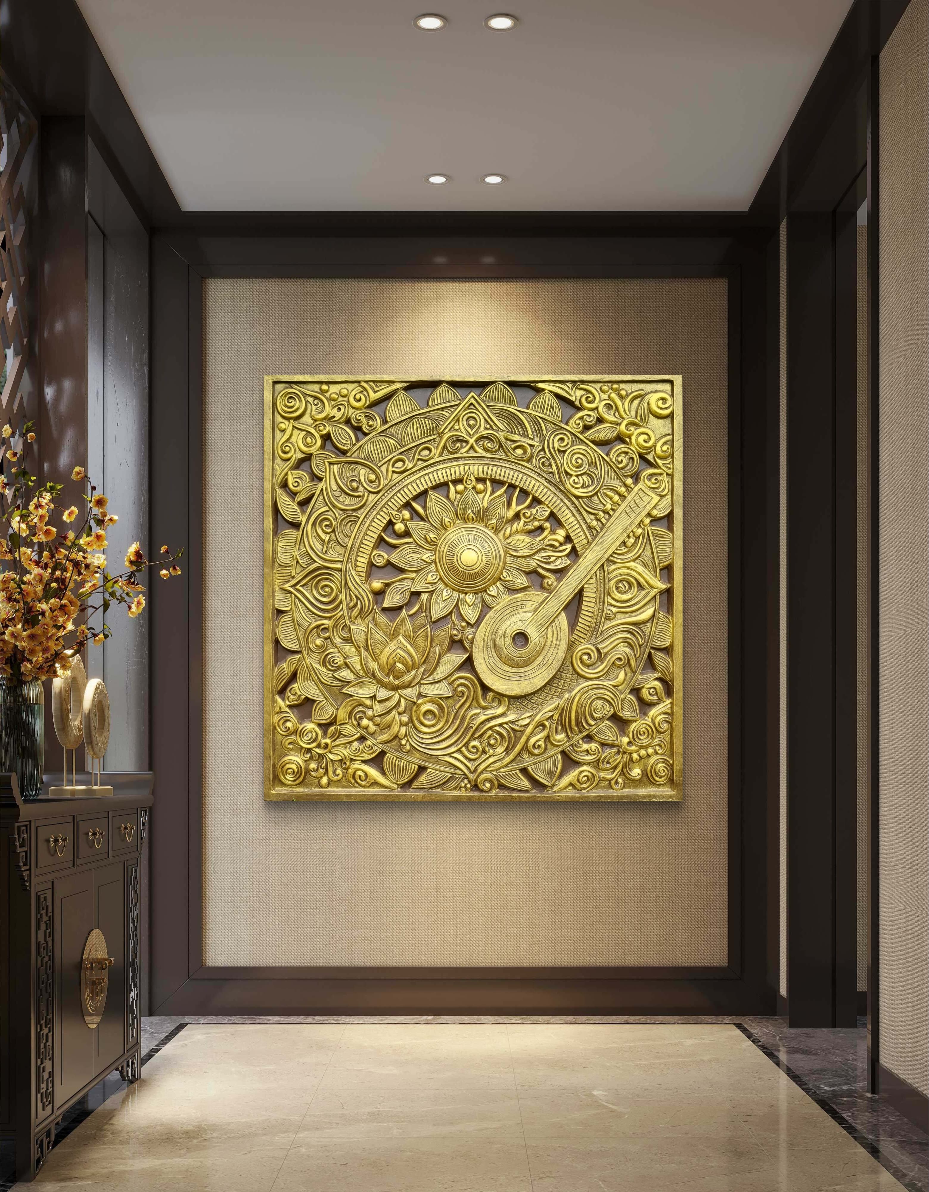 Golden 5x5 feet 3D mural featuring an intricately carved Tanpura and surrounding floral patterns.