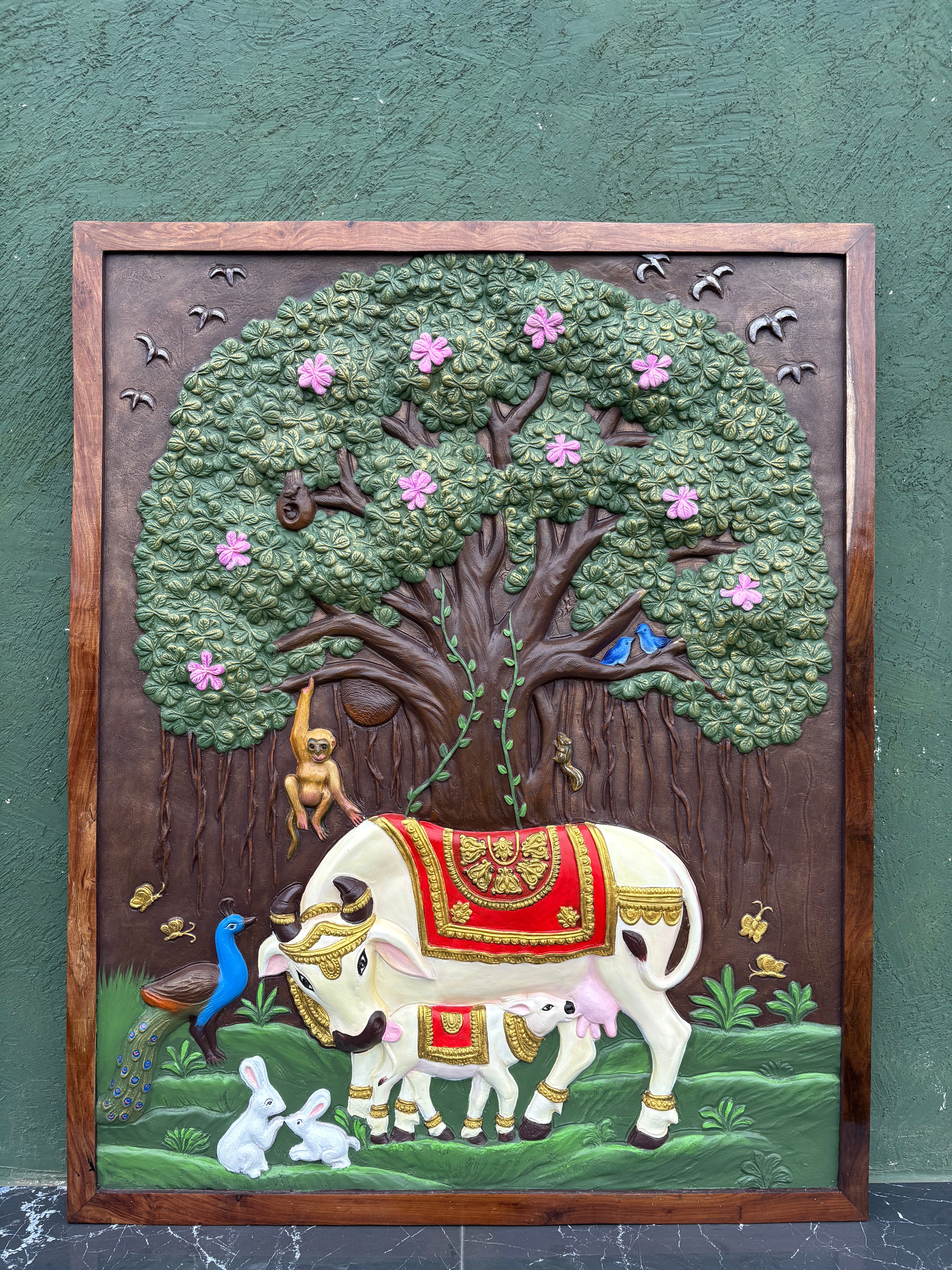 Kamdhenu and calf 3D relief mural with sacred Banyan Tree of Life, handcrafted wall art for spiritual home decor, 5x4 feet framed and in multicolour.