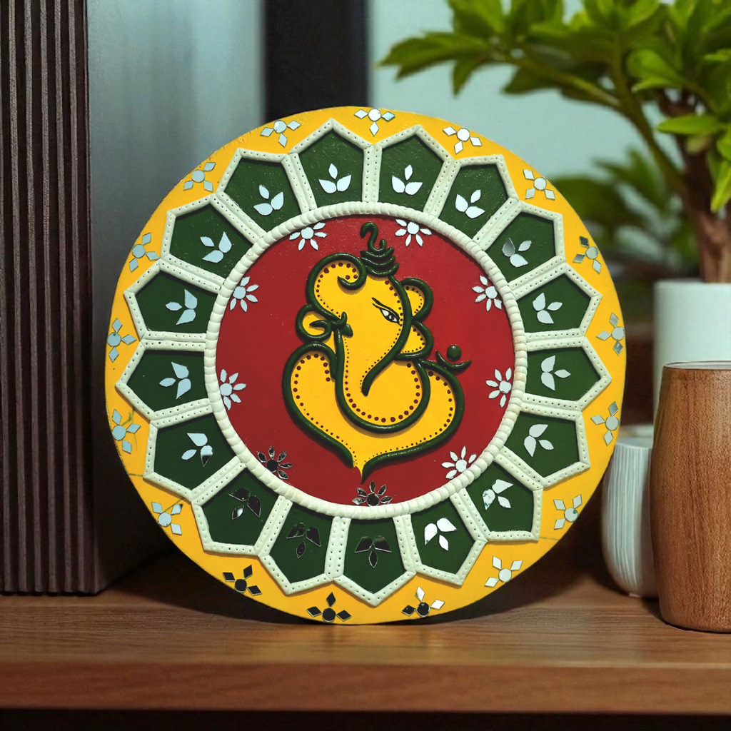Lord Ganesha wall hanging in traditional Lippan mud art style, perfect for spiritual and cultural home decor.