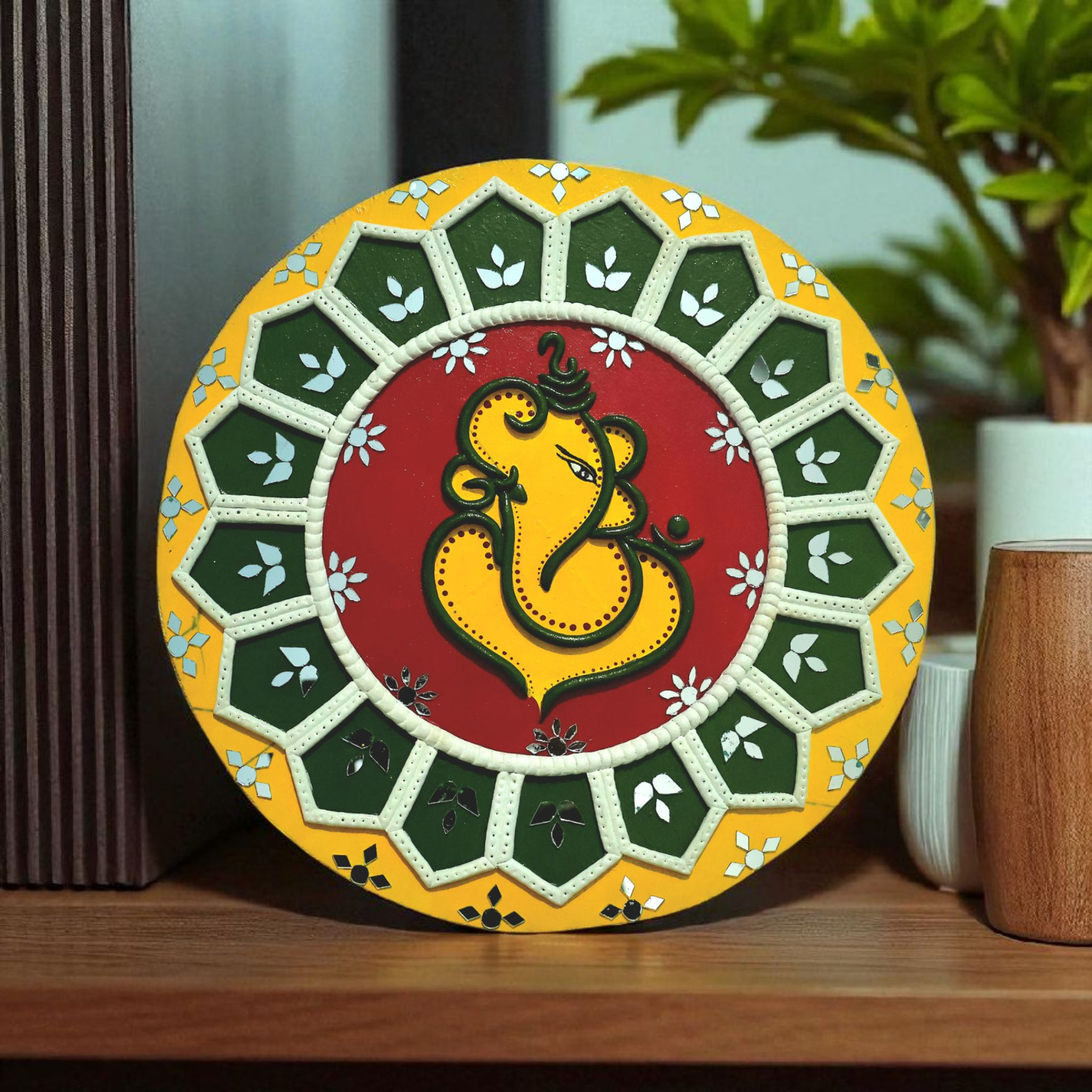 Lord Ganesha wall hanging in traditional Lippan mud art style, perfect for spiritual and cultural home decor.