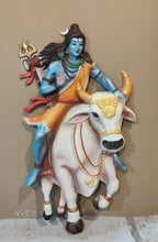 Close-up of Lord Shiva seated on Nandi in a 3D relief mural highlighting intricate sculpted details.