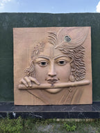 Detailed texture of Madhav Divine Flute wall mural showing layered relief work and fine surface detailing.