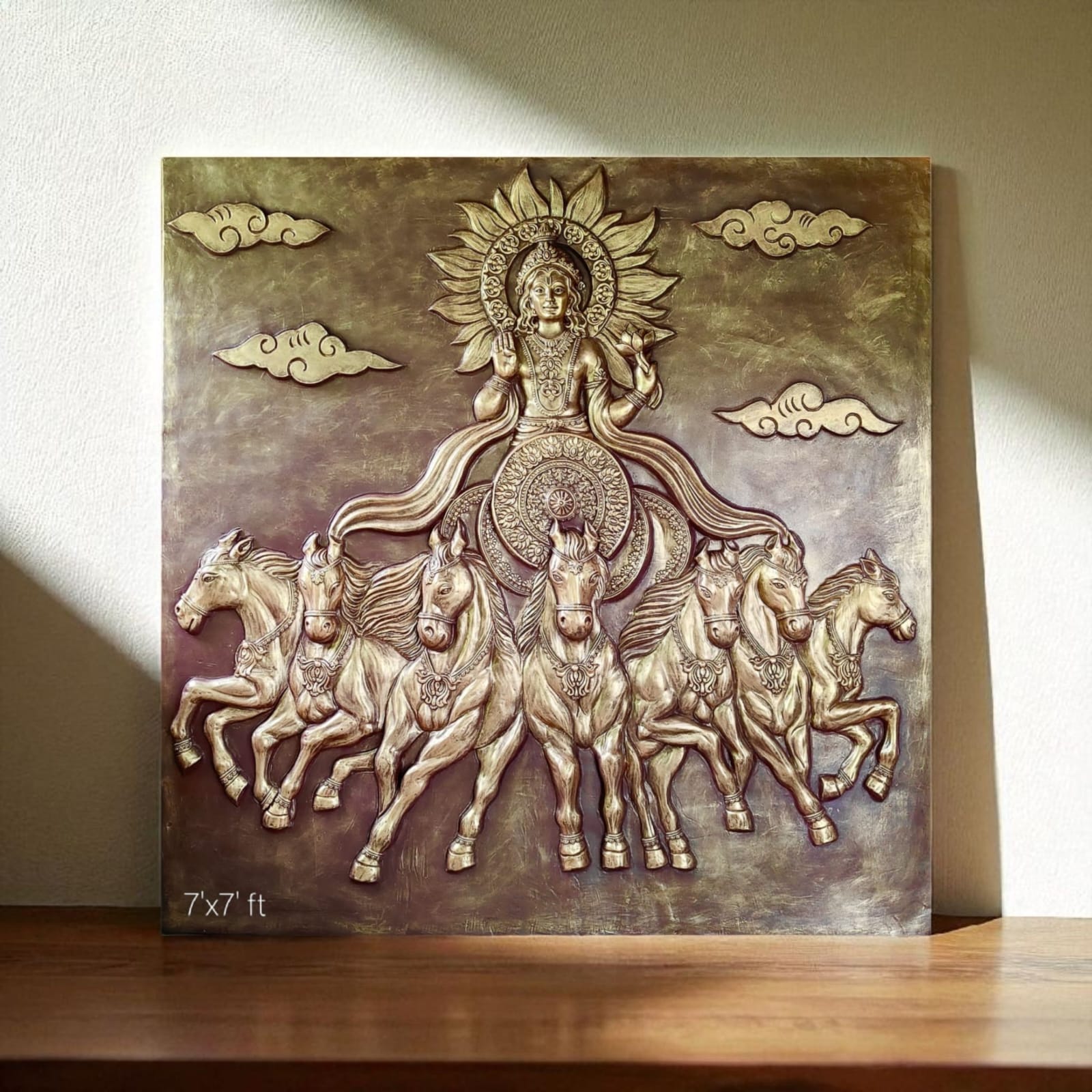 3D relief wall art of the Sun God Surya with seven horses, symbolizing power, brilliance, and spiritual energy.