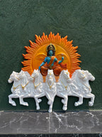 Handcrafted Surya Narayana wall art depicting the divine Sun God riding a chariot drawn by seven horses in multicolour and size is 4x3.5 feet