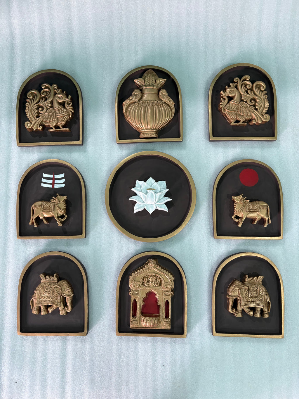 Close-up view of textured detailing on decorative prabhavali wall motifs